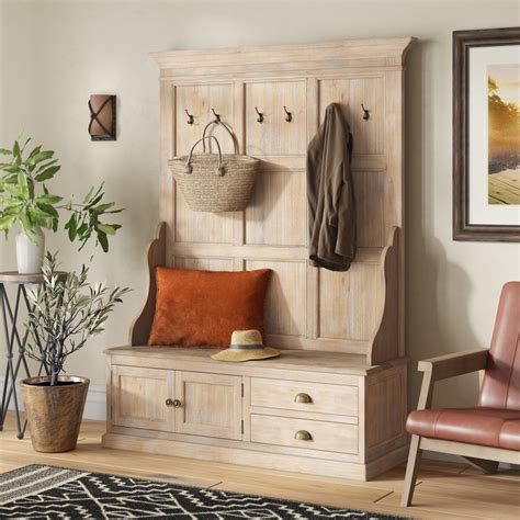 Wayfair hall tree - This hall tree’s sleek design fits in with all decors and provides the essential storage space you need. The package includes an instruction booklet for easy assembly. Constructed from non-toxic, solid boxwood and solid wood veneer. Bernnadette Hall Tree 40'' Wide with Bench. Rated 4 out of 5 stars. 981 total votes.